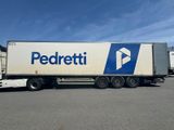 a semi truck that is parked in a parking lot