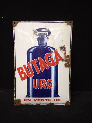 une photo d'un panneau sur lequel on peut lire « buttag urg »