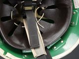 a close up of a helmet with a strap on it