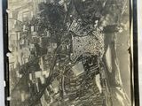 an old black and white photo of an aerial view of a city