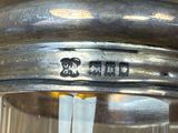 a close up of a silver object on a table