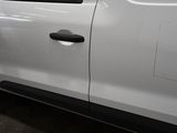 a white van that is parked in a garage