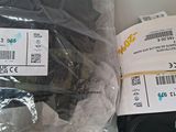 two packages of electronic equipment sitting on a table