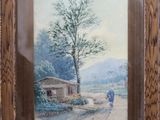 tableau encadré représentant une scène champêtre avec un homme marchant sur une route
