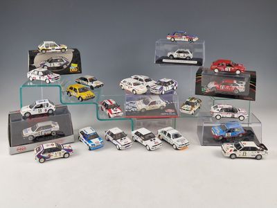 a lot of toy cars that are in a display case
