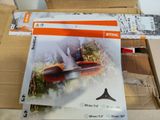 a picture of a picture of a knife in a box