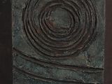 an image of a close up of a metal object on a table