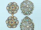 three antique brooches and a pair of earrings
