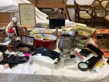 a table with many items on it in a room