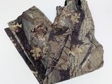 camouflage pants on a white surface with a white background