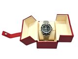 a close up of a watch in a box on a white background