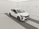 the white car is parked in the garage on the checkered floor