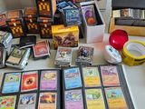 a table with a lot of cards and other items on it