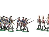 several figurines of men in uniforms are lined up in a line