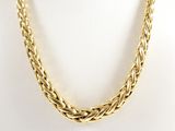 a gold necklace on a mannequin mannequin mannequin mannequin mannequin mannequin mannequin mannequin mannequin