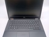 the dell laptop is open and ready to be used