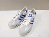 pair of white and blue adidas sneakers on a white surface