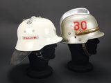 pair of firemen ' s helmets with the number 80 and the number 80 on them
