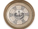 une assiette avec l'image d'un château