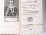 a book with a picture of a man in a dress