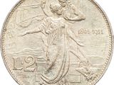 an image of a silver coin with a woman holding a bird