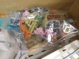 a box full of assorted toys sitting on a table