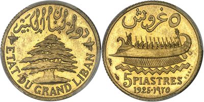 a gold coin with a picture of a boat on it