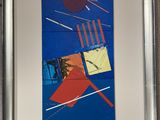 tableau encadré représentant une chaise rouge sur fond bleu