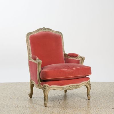 an image of a red chair with a gold frame