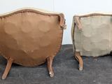 pair of chairs with arms and legs made out of paper maching