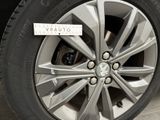a close up of a tire with a sticker on it