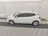 a picture of a white car parked in a garage