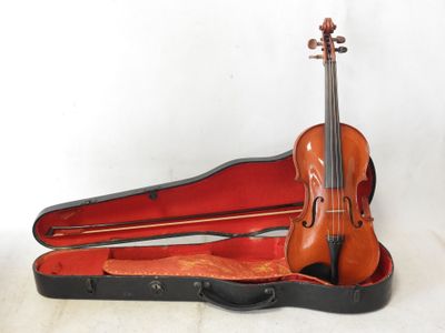 a violin in a case with a bow in it