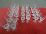 a lot of empty glasses on the table