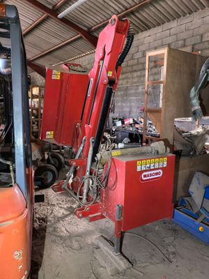 a forklift that is sitting in a garage