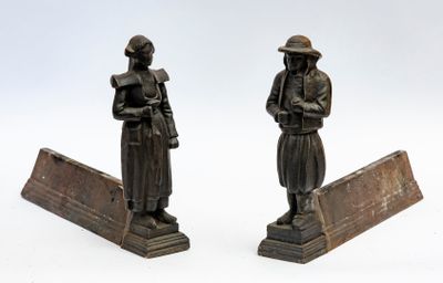 pair of antique bronze figurines of a man and a woman