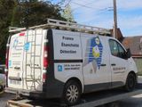 a van that is parked on a flatbed trailer