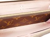 louis vuitton zippy wallet in pink monogram canvas with gold hardware