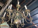 a chandelier hanging from the ceiling of a building