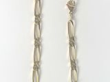 silver plated chain necklace with oval links on a white background