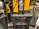 a machine that is sitting on a table in a factory
