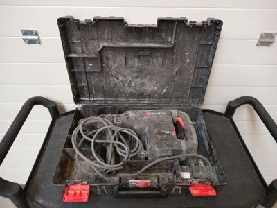 a tool box that is sitting on top of a cart