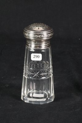 a glass salt and pepper shaker on a black background
