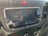 a picture of a car dashboard with a digital display