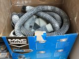 a box with a hose in it sitting on a table