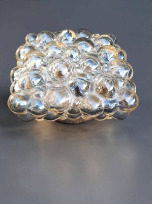 a close up of a glass object on a table