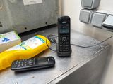 an image of a cell phone and a banana on a counter