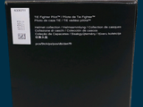 a black box with a red and white logo on it