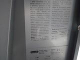 a picture of a close up of a paper on a refrigerator