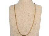 a gold chain necklace on a mannequin mannequin mannequin mannequin mannequin mannequin mannequin mannequin manne